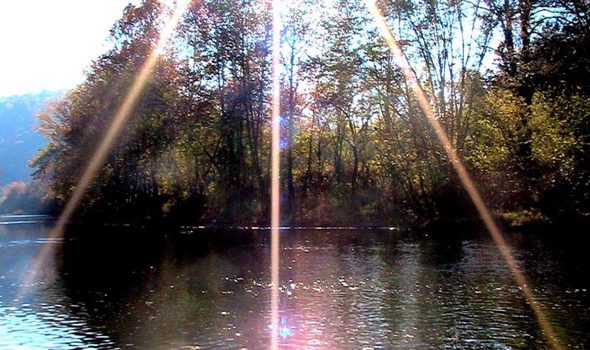Sunburst Over River